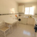 Fully equipped kitchen, with a view of the beach
